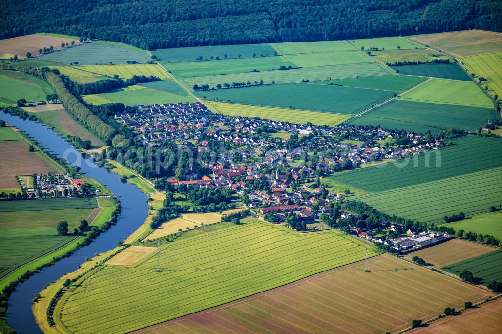Grohnde from above - City view on the river bank of the Weser river in Grohnde in the state Lower Saxony, Germany