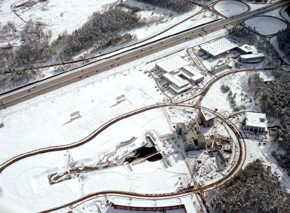 Aerial image Drewitz - Winterstimmung auf den Baustellen Europark Dreilinden in Drewitz - ein Projekt der EUROPARC DREILINDEN GmbH in 14532 Kleinmachnow am Albert-Einstein-Ring 1 (Frau Anne-Kathrin Kaeller - Tel.: 030-21733103 / Fax.: 030-21733106).