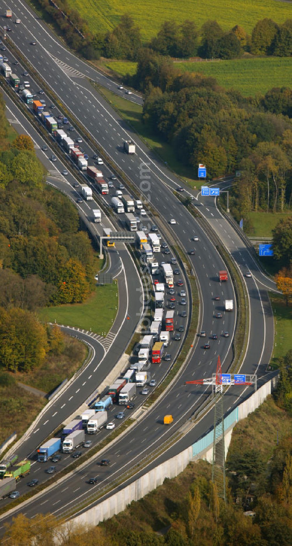 Hagen from the bird's eye view: Stau auf der A1 Autobahn bei Hagen in Nordrhein-Westfalen. Traffic jam on the A1 motorway in the near of Hagen in North Rhine-Westphalia.