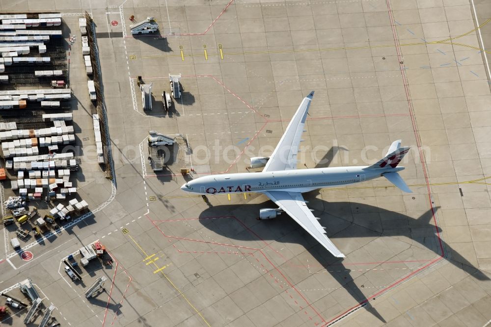 Aerial image Berlin - Dispatch building and terminals on the premises of the airport Tegel Tegel with QATAR cargo plane on the apron in Berlin