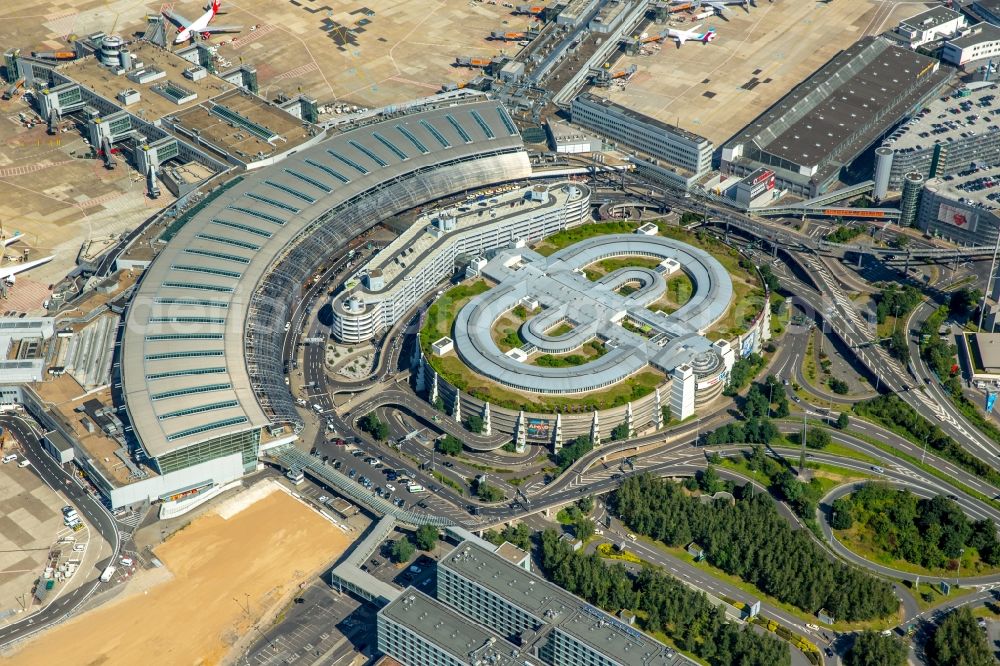 Düsseldorf from above - Dispatch building and terminals on the premises of the airport Airport-City DUS on Flughafenstrasse in Duesseldorf in the state North Rhine-Westphalia