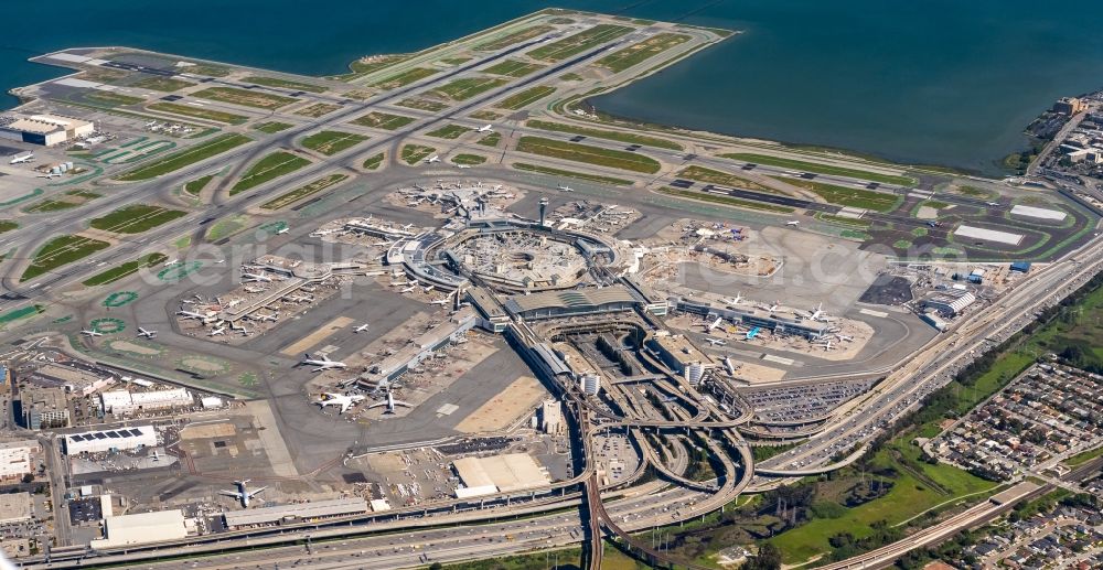 San Francisco from the bird's eye view: Dispatch building and terminals on the premises of the airport - SFO International Terminal Main Hall in San Francisco in California - USA