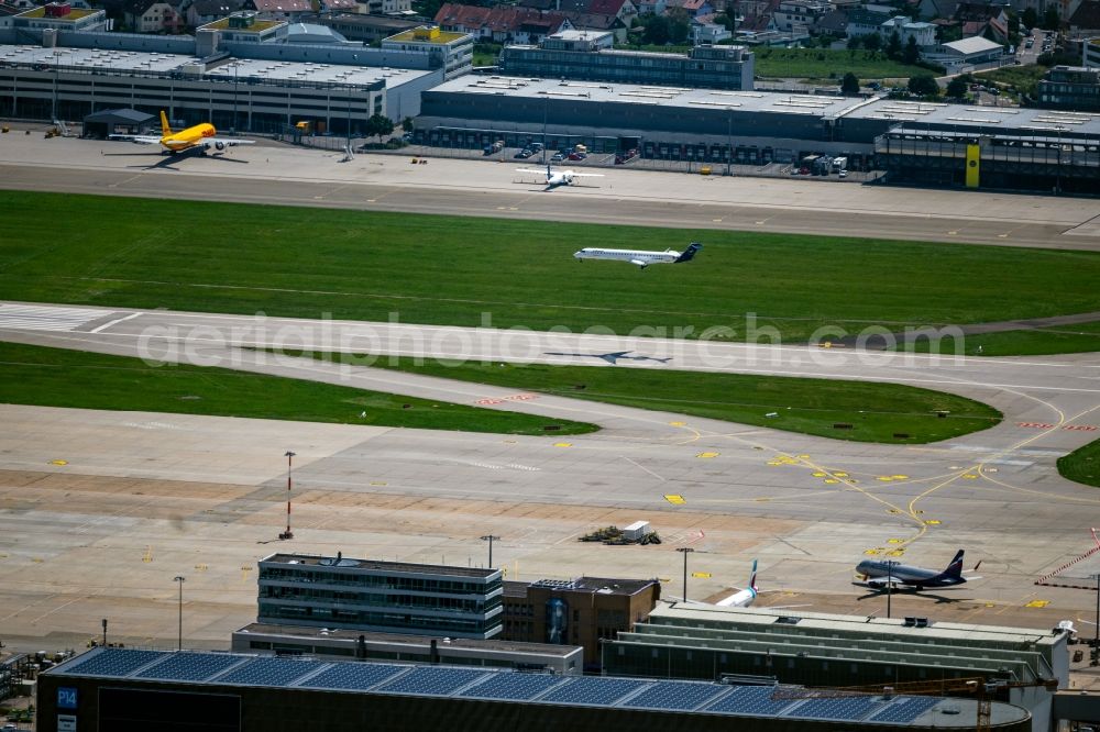 Stuttgart from the bird's eye view: Dispatch building and terminals on the premises of the airport in Stuttgart in the state Baden-Wuerttemberg