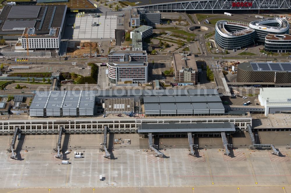 Stuttgart from the bird's eye view: Dispatch building and terminals on the premises of the airport in Stuttgart in the state Baden-Wuerttemberg, Germany