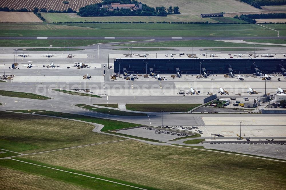 Wien from above - Dispatch building and terminals on the premises of the airport Schwechat in Vienna in Lower Austria, Austria