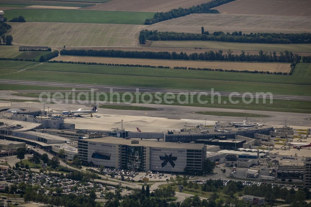 Wien from above - Dispatch building and terminals on the premises of the airport Schwechat in Vienna in Lower Austria, Austria