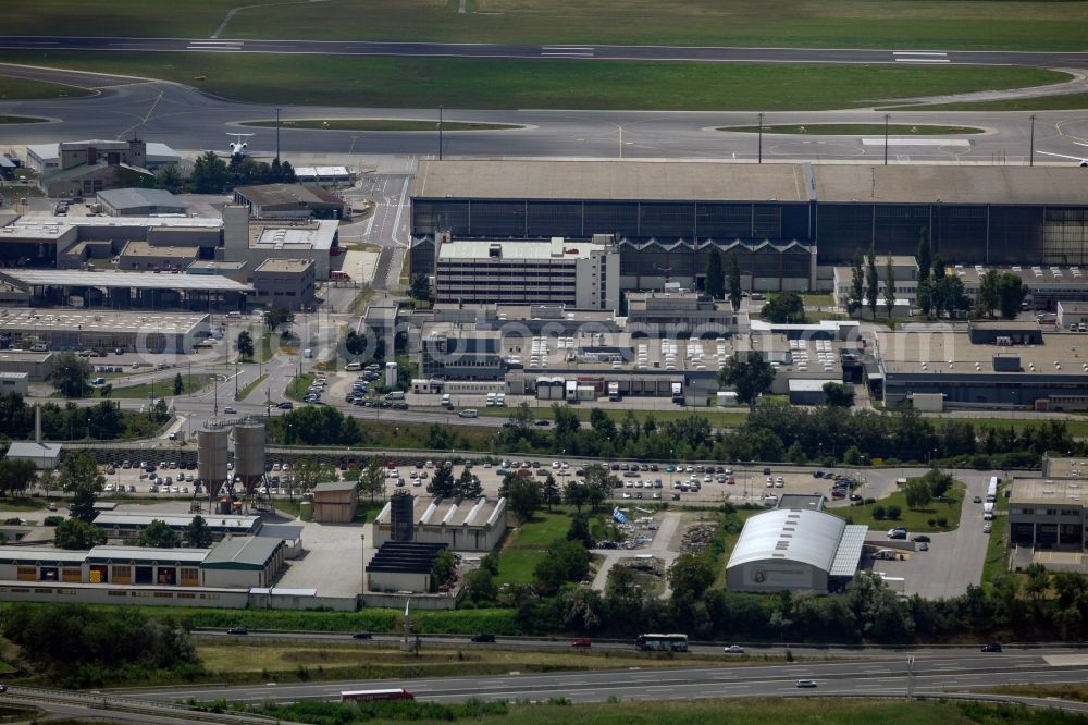 Wien from above - Dispatch building and terminals on the premises of the airport Schwechat in Vienna in Lower Austria, Austria