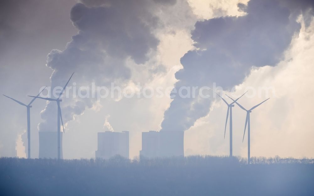 Grevenbroich from above - White exhaust smoke plumes from the power plants and exhaust towers of the coal-fired cogeneration plant Frimmersdorf in Grevenbroich in the state North Rhine-Westphalia, Germany