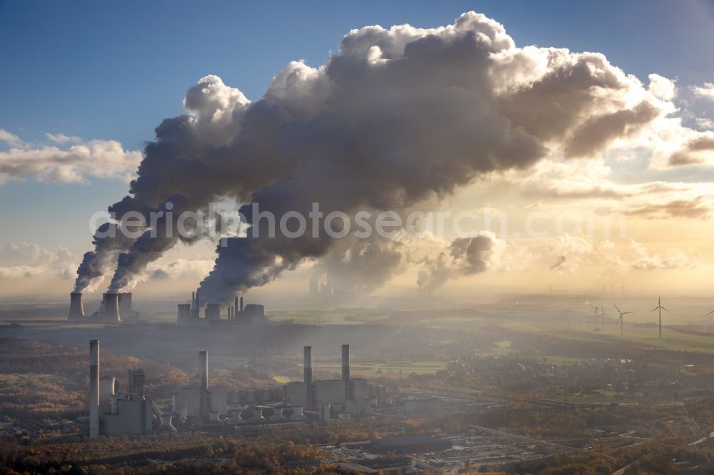 Grevenbroich from above - White exhaust smoke plumes from the power plants and exhaust towers of the coal-fired cogeneration plant Frimmersdorf in Grevenbroich in the state North Rhine-Westphalia, Germany