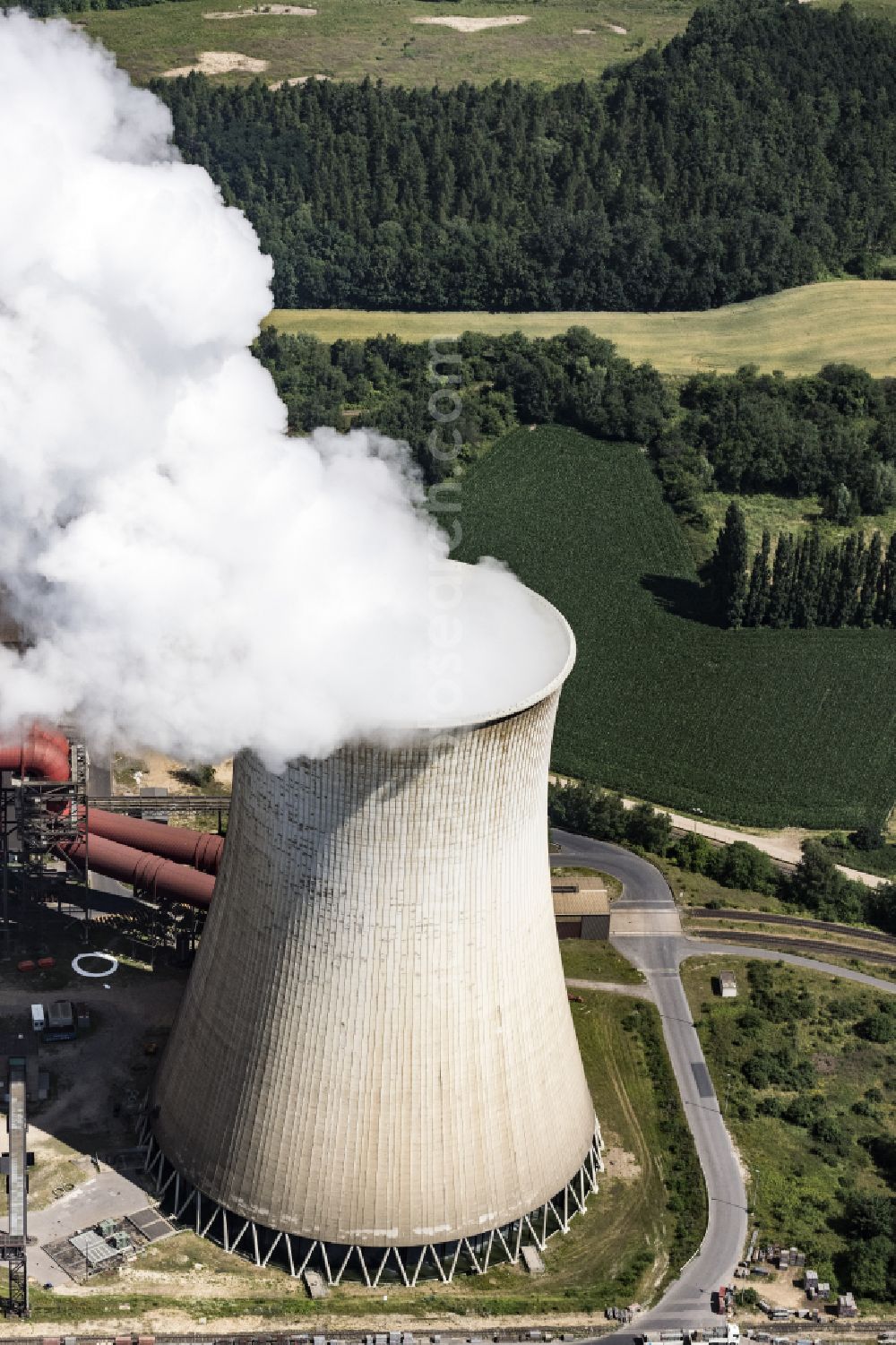 Aerial image Eschweiler - White exhaust smoke plumes from the power plants and exhaust towers of the coal-fired cogeneration plant on street Am Kraftwerk in the district Weisweiler in Eschweiler in the state North Rhine-Westphalia, Germany