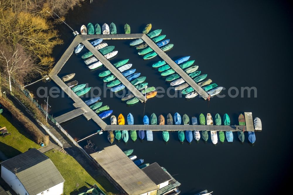 Duisburg from above - Covered boat from the jetty on the lake Masur in Duisburg / Wedaustadion in North Rhine-Westphalia. The Masurensee part of the Six Lakes area