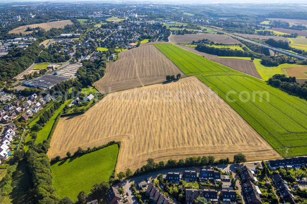 Aerial image Hetterscheidt - Field structures of a harvested grain field in Hetterscheidt at Ruhrgebiet in the state North Rhine-Westphalia, Germany