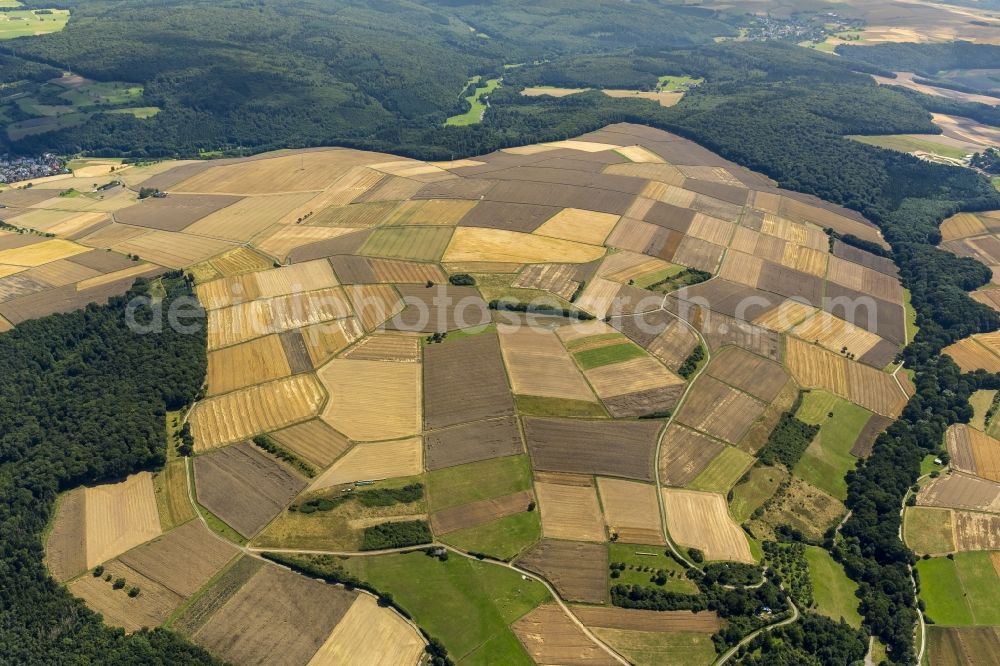 Rückershausen, Aarbergen from above - Field structures of a harvested grain field in Rueckershausen, Aarbergen in the state Hesse