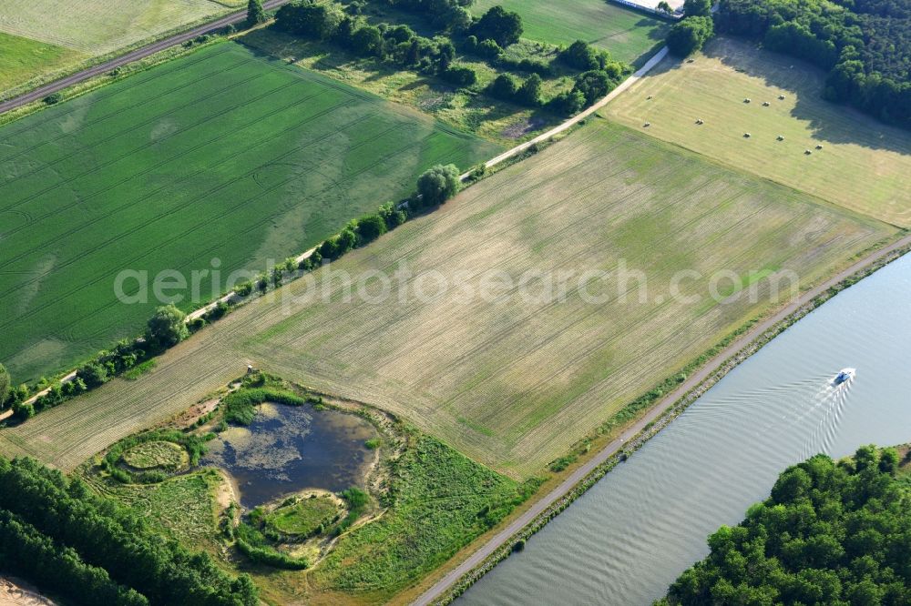 Genthin from the bird's eye view: Deposition surfaces at the works way bridge over the Fiener main on-site preflooder at the Elbe-Havel Canal in Genthin in the state Saxony-Anhalt