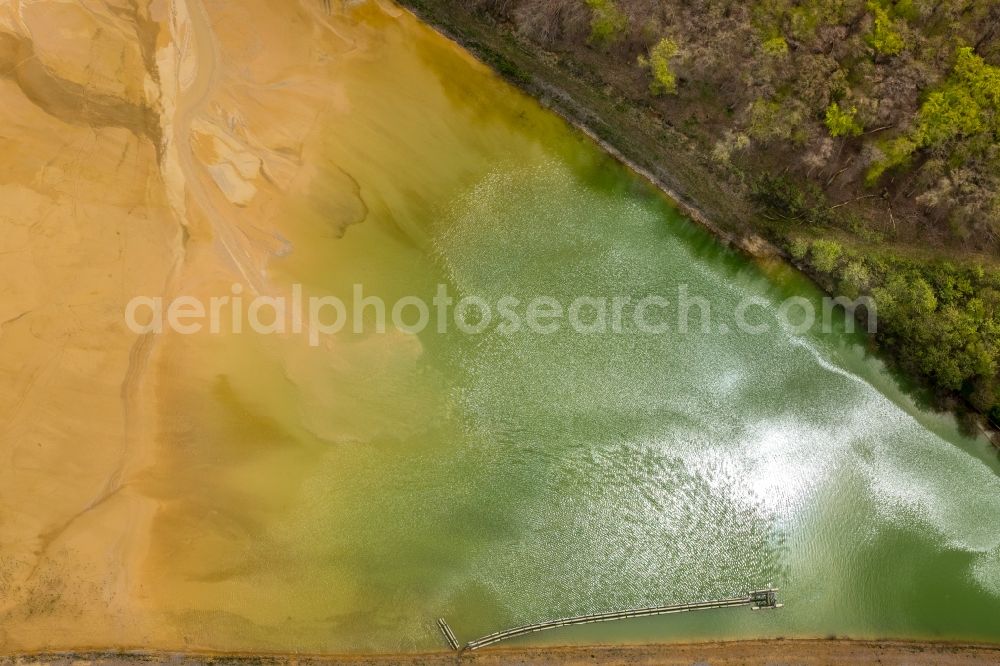 Aerial photograph Brilon - Deposits and rinsing fields on the quarry for the mining and handling of of Rheinkalk Messinghausen GmbH & Co. KG in Brilon in the state North Rhine-Westphalia, Germany