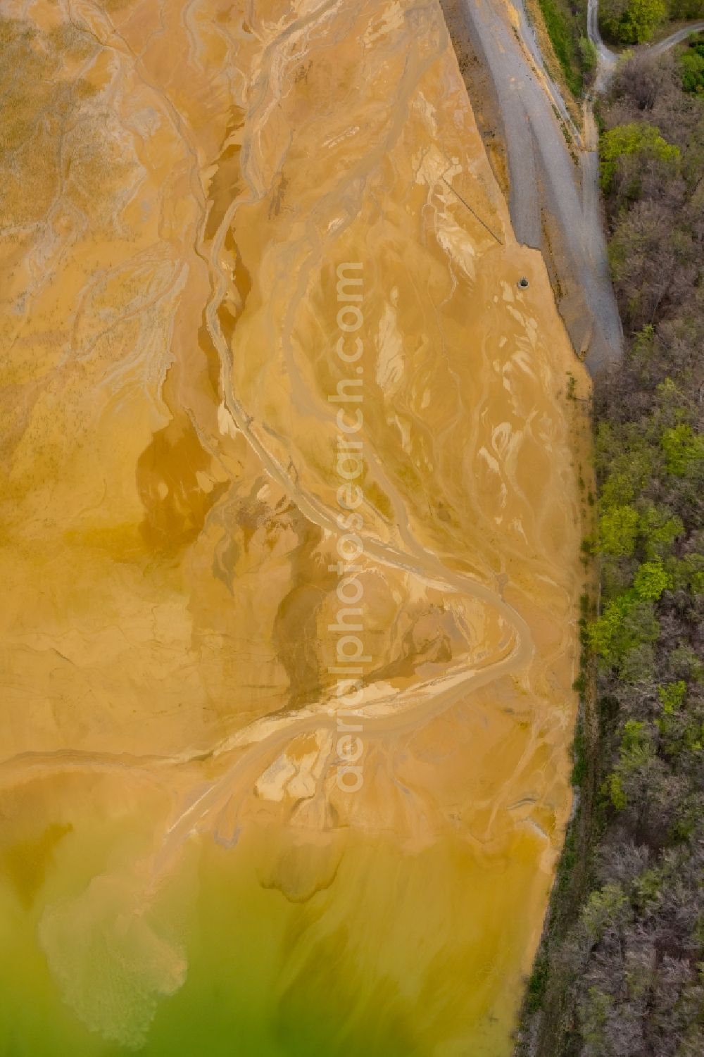 Aerial photograph Brilon - Deposits and rinsing fields on the quarry for the mining and handling of of Rheinkalk Messinghausen GmbH & Co. KG in Brilon in the state North Rhine-Westphalia, Germany