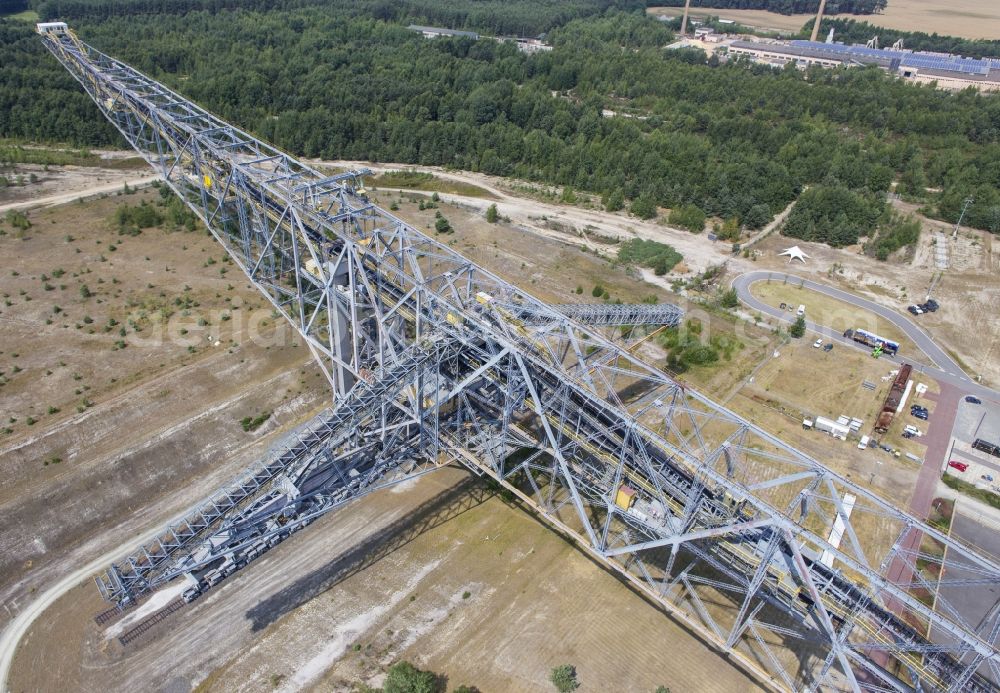 Aerial photograph Lichterfeld - View conveyor bridge F60 in Besucherbergwerk of former coal mining area of Lusatia. field with lights in the state of Brandenburg