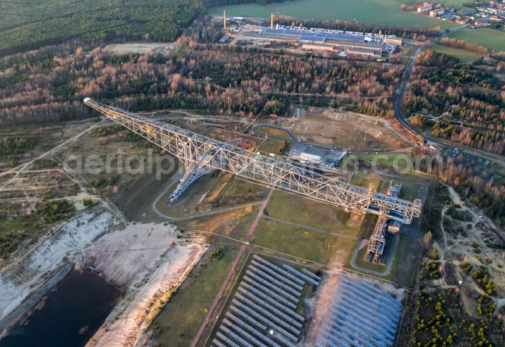 Lichterfeld-Schacksdorf from the bird's eye view: View conveyor bridge F60 in Besucherbergwerk of former coal mining area of Lusatia. field with lights in the state of Brandenburg