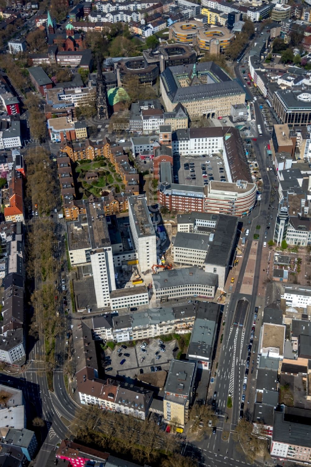 Bochum from the bird's eye view: Demolition, demolition and unsealing work on the concrete surfaces of an office and commercial building for the construction of the Viktoria-Karree in Bochum in the federal state of North Rhine-Westphalia, Germany