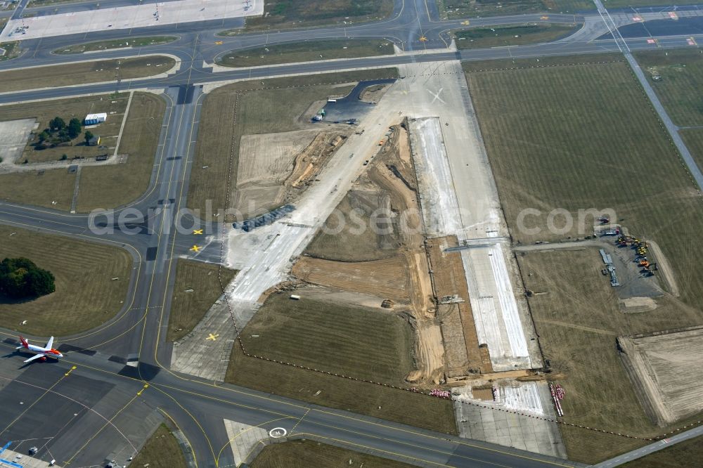 Schönefeld from above - Demolition and unsealing work on the concrete surfaces of old runway in Schoenefeld in the state Brandenburg, Germany