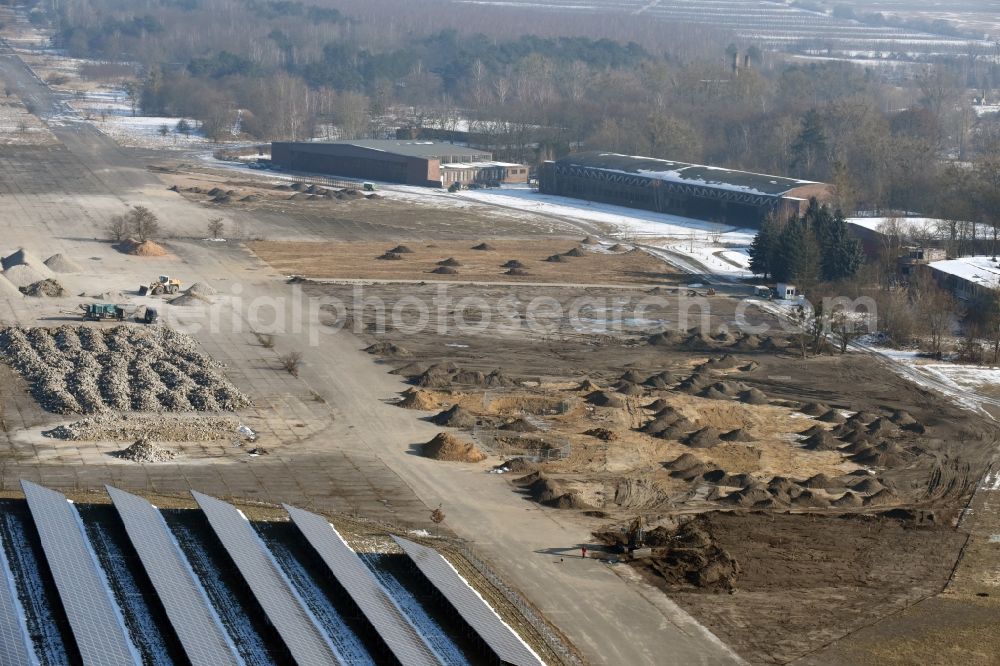 Aerial image Werneuchen - Demolition and unsealing work on the concrete surfaces the former storage areas and taxiways of the airfield in Werneuchen in the state Brandenburg