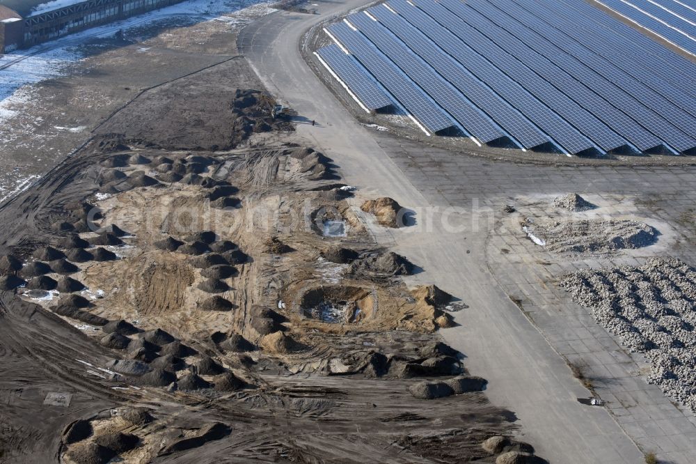 Aerial photograph Werneuchen - Demolition and unsealing work on the concrete surfaces the former storage areas and taxiways of the airfield in Werneuchen in the state Brandenburg