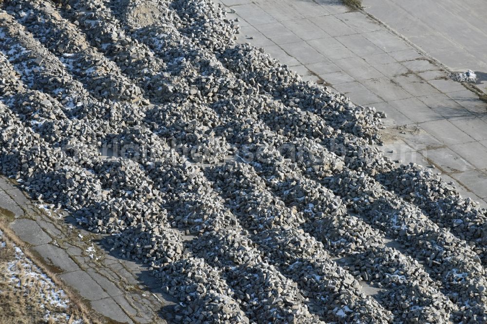 Werneuchen from the bird's eye view: Demolition and unsealing work on the concrete surfaces the former storage areas and taxiways of the airfield in Werneuchen in the state Brandenburg