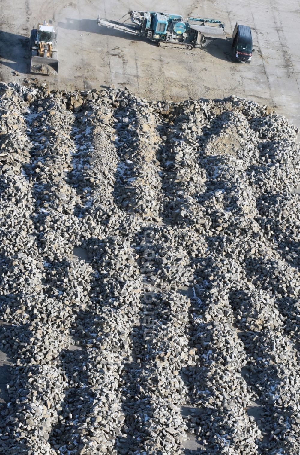 Aerial image Werneuchen - Demolition and unsealing work on the concrete surfaces the former storage areas and taxiways of the airfield in Werneuchen in the state Brandenburg