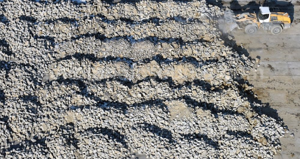 Werneuchen from above - Demolition and unsealing work on the concrete surfaces the former storage areas and taxiways of the airfield in Werneuchen in the state Brandenburg