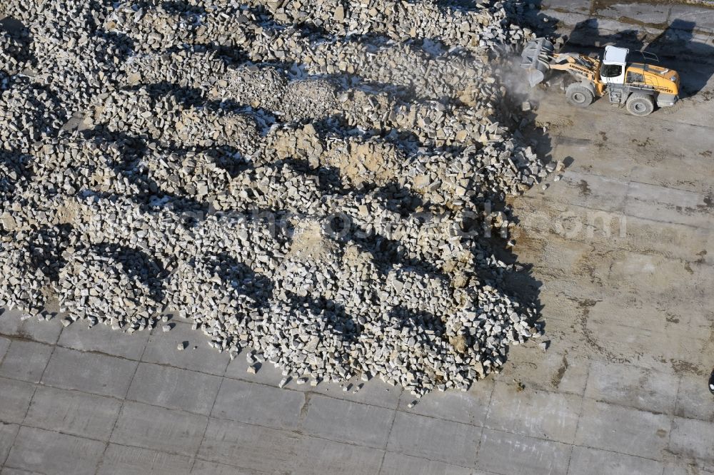 Aerial image Werneuchen - Demolition and unsealing work on the concrete surfaces the former storage areas and taxiways of the airfield in Werneuchen in the state Brandenburg