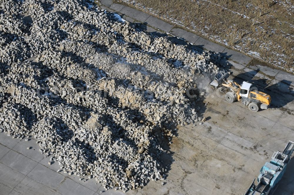 Aerial photograph Werneuchen - Demolition and unsealing work on the concrete surfaces the former storage areas and taxiways of the airfield in Werneuchen in the state Brandenburg