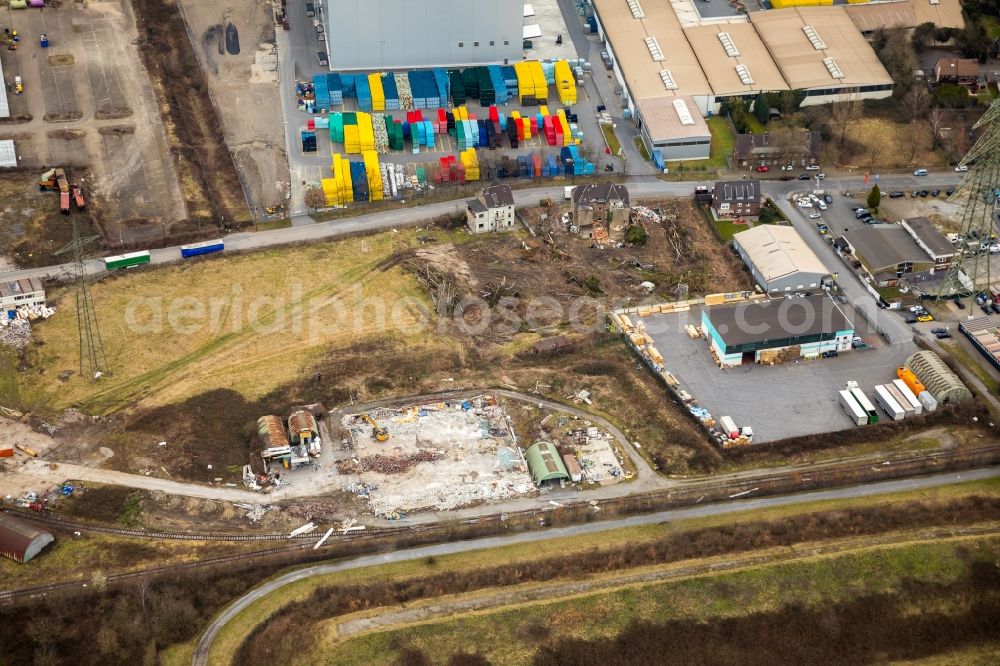 Duisburg from the bird's eye view: Demolition, demolition and unsealing works on the concrete surfaces of the former company premises on the Rheinstrasse in Duisburg in the state of North Rhine-Westphalia, Germany