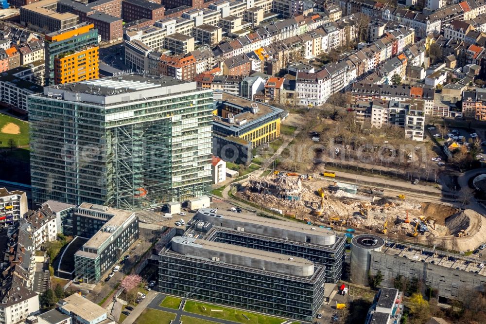 Düsseldorf from the bird's eye view: Demolition and unsealing work on the concrete surfaces of the former commercial building on Voelklinger Strasse in Dusseldorf in the federal state of North Rhine-Westphalia, Germany