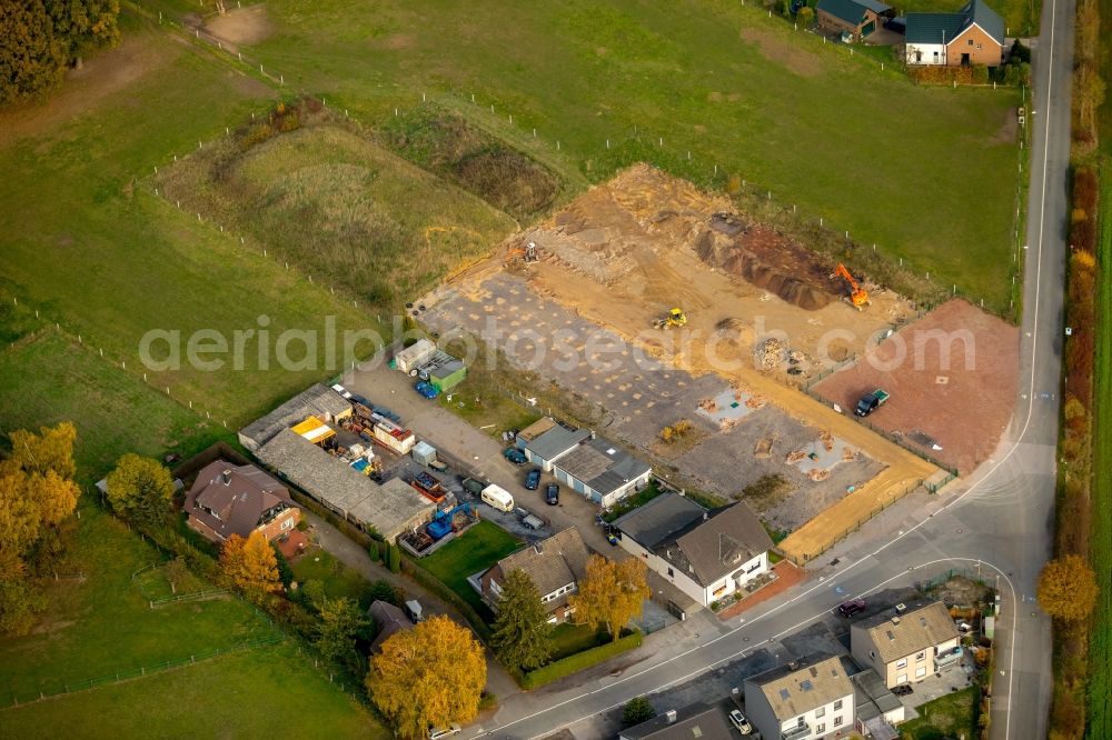 Bottrop from the bird's eye view: Demolition and unsealing work on the concrete surfaces on Gregorstrasse corner Wiedau in the district Kirchhellen in Bottrop in the state North Rhine-Westphalia, Germany