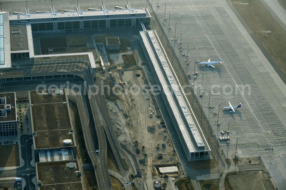 Aerial photograph Schönefeld - Demolition and unsealing work on the concrete surfaces of Parkflaechen on August-Heinrich-Euler-Strasse on Flughafen BER in Schoenefeld in the state Brandenburg, Germany