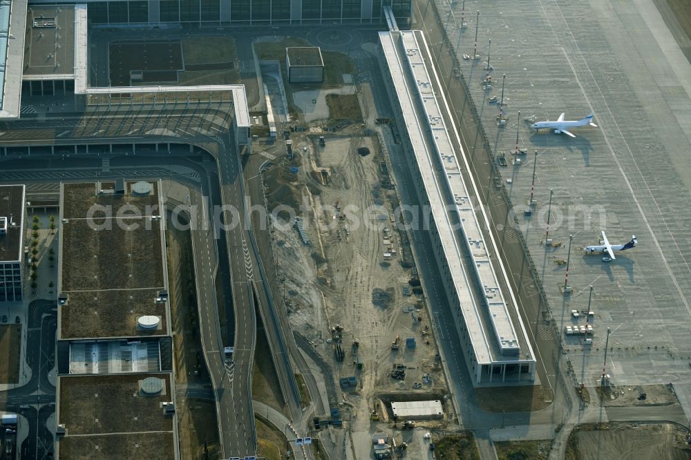 Schönefeld from above - Demolition and unsealing work on the concrete surfaces of Parkflaechen on August-Heinrich-Euler-Strasse on Flughafen BER in Schoenefeld in the state Brandenburg, Germany