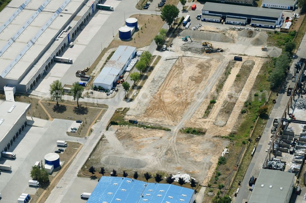 Hoppegarten from the bird's eye view: Demolition and unsealing work on the concrete surfaces on Industriestrasse in Hoppegarten in the state Brandenburg, Germany