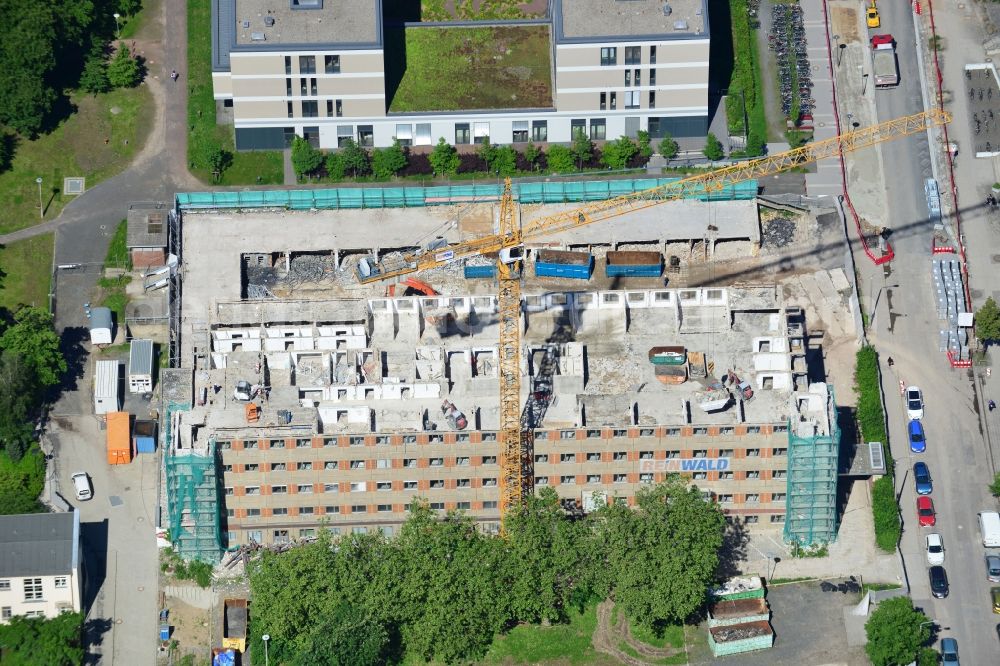 Leipzig from the bird's eye view: View of the construction site for demolition of the old bed of the house at the University Hospital in Leipzig, Liebig Street in Saxony