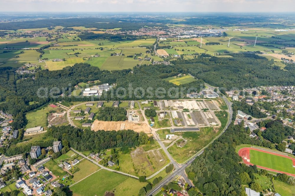 Emmerich am Rhein from the bird's eye view: Demolition and clearance work on the building complex of the former military barracks Moritz-von-Nassau-Kaserne in the district Huethum in Emmerich am Rhein in the state North Rhine-Westphalia, Germany