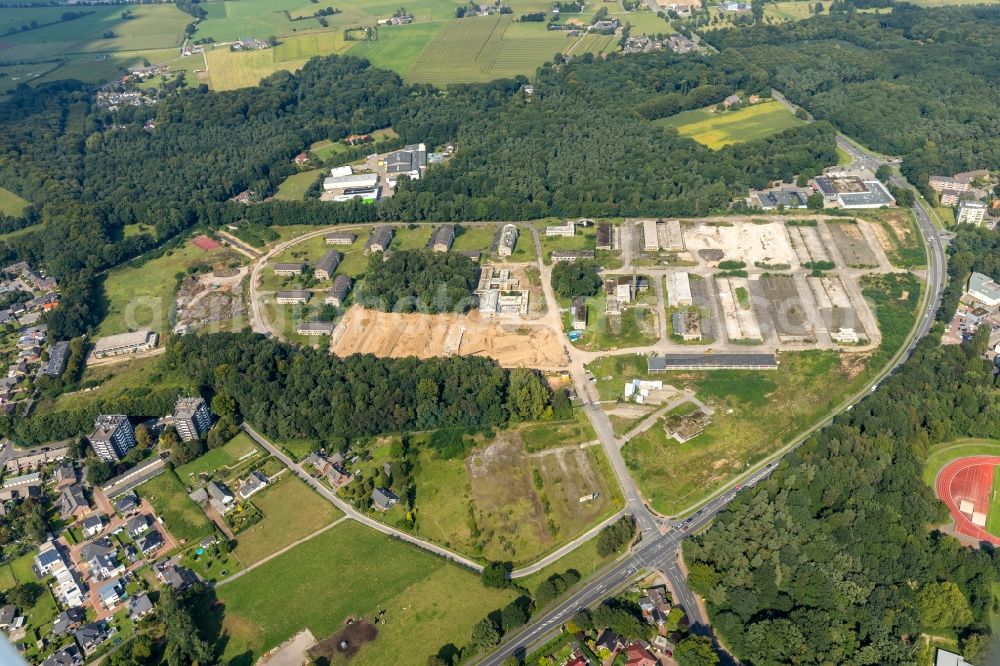 Emmerich am Rhein from above - Demolition and clearance work on the building complex of the former military barracks Moritz-von-Nassau-Kaserne in the district Huethum in Emmerich am Rhein in the state North Rhine-Westphalia, Germany