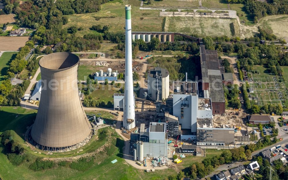 Dortmund from above - Demolition and dismantling of the decommissioned power plants and exhaust towers of the cogeneration plant Gustav Knepper in the district Mengede in Dortmund in the state North Rhine-Westphalia, Germany