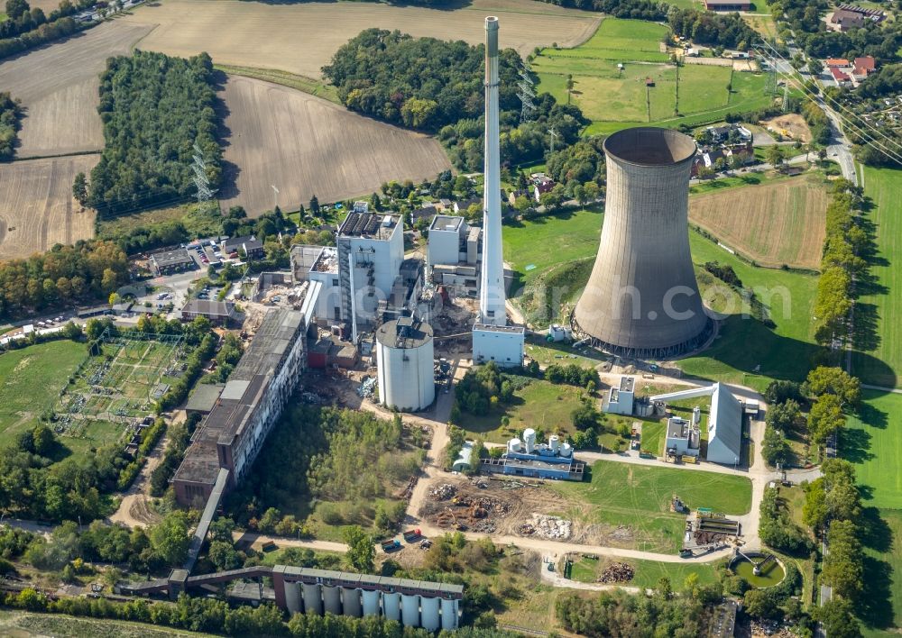 Dortmund from above - Demolition and dismantling of the decommissioned power plants and exhaust towers of the cogeneration plant Gustav Knepper in the district Mengede in Dortmund in the state North Rhine-Westphalia, Germany