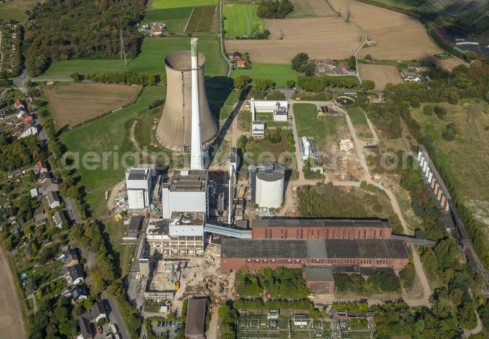 Dortmund from above - Demolition and dismantling of the decommissioned power plants and exhaust towers of the cogeneration plant Gustav Knepper in the district Mengede in Dortmund in the state North Rhine-Westphalia, Germany