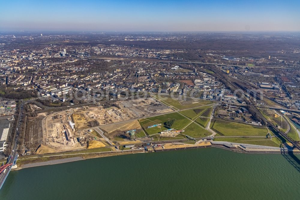 Duisburg from the bird's eye view: Demolition and disposal work on the remains of the ruins of Drahtwalzwerks of ArcelorMittal Hochfeld GmbH on Woerthstrasse for the new building of the Quartier RHEINORT in Duisburg at Ruhrgebiet in the state North Rhine-Westphalia, Germany