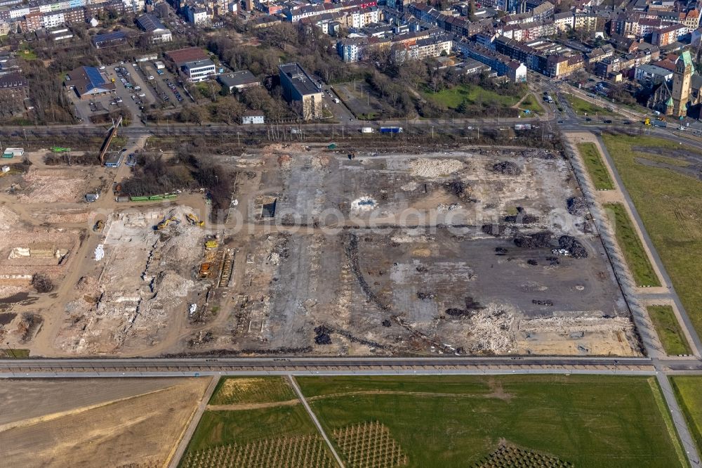 Aerial photograph Duisburg - Demolition and disposal work on the remains of the ruins of Drahtwalzwerks of ArcelorMittal Hochfeld GmbH on Woerthstrasse for the new building of the Quartier RHEINORT in Duisburg at Ruhrgebiet in the state North Rhine-Westphalia, Germany