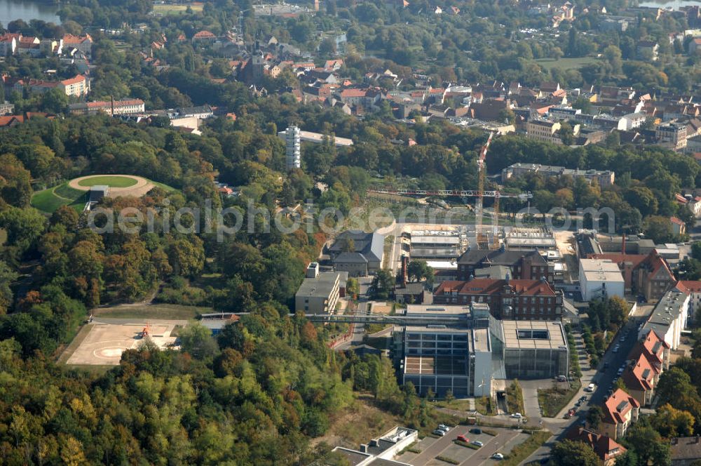 Aerial photograph Brandenburg - Blick auf die Abriss- und Neubaufläche des Klinikum Brandenburg. Der Krankenhauskomplex ist in etwa 100 Jahre alt. Nach dem ersten Bauabschnitt wurde der Grundstein für den zweiten Bauabschnitt im September 2008 gelegt. Es erfolgte der Abriss der auf dem zukünftigen Baufeld stehenden Gebäude. Geplant sind 10 neue Stationen. Die geplante Fertigstellung ist auf den Anfang des Jahres 2011 gemünzt. Architekten sind Heinle, Wischer und Partner aus Berlin. Kontakt Architekten: Heinle, Wischer und Partner, Freie Architekten, Villastraße 1, 70190 Stuttgart, Tel. +49(0)711 16654 0, Fax +49(0)711 16654 77, Email: stuttgart@heinlewischerpartner.de; Kontakt Klinik: Städtisches Klinikum Brandenburg GmbH, Akademisches Lehrkrankenhaus der Charité, Hochstraße 29, 14770 Brandenburg an der Havel, Tel. +49(0)3381 41 10, Fax +49(0)3381 41 3000, Email: skb@klinikum-brandenburg.de; BATEG Ingenieurbau GmbH, GENIUS IB