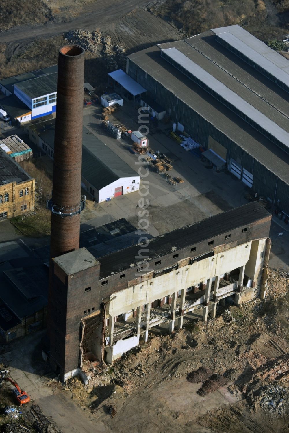 Holzweißig from the bird's eye view: Demolition of the ruins of the former pipe works Holzweißig in Saxony-Anhalt