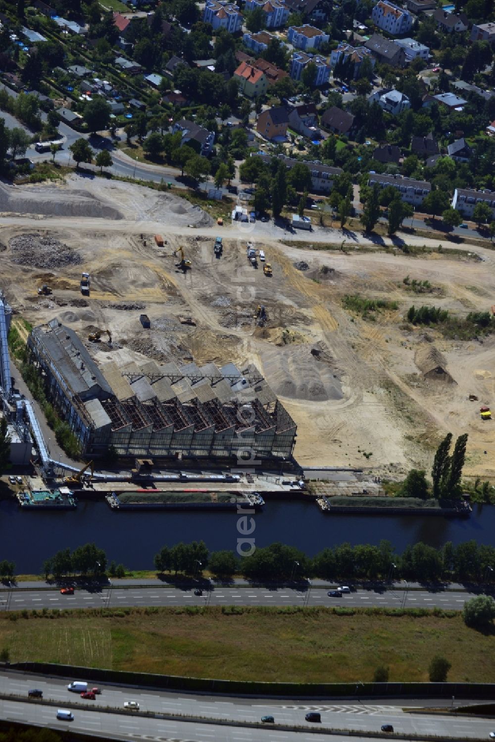 Berlin from the bird's eye view: Demolition work on the former industrial site on the banks of the Teltow Canal in Neukölln district in Berlin