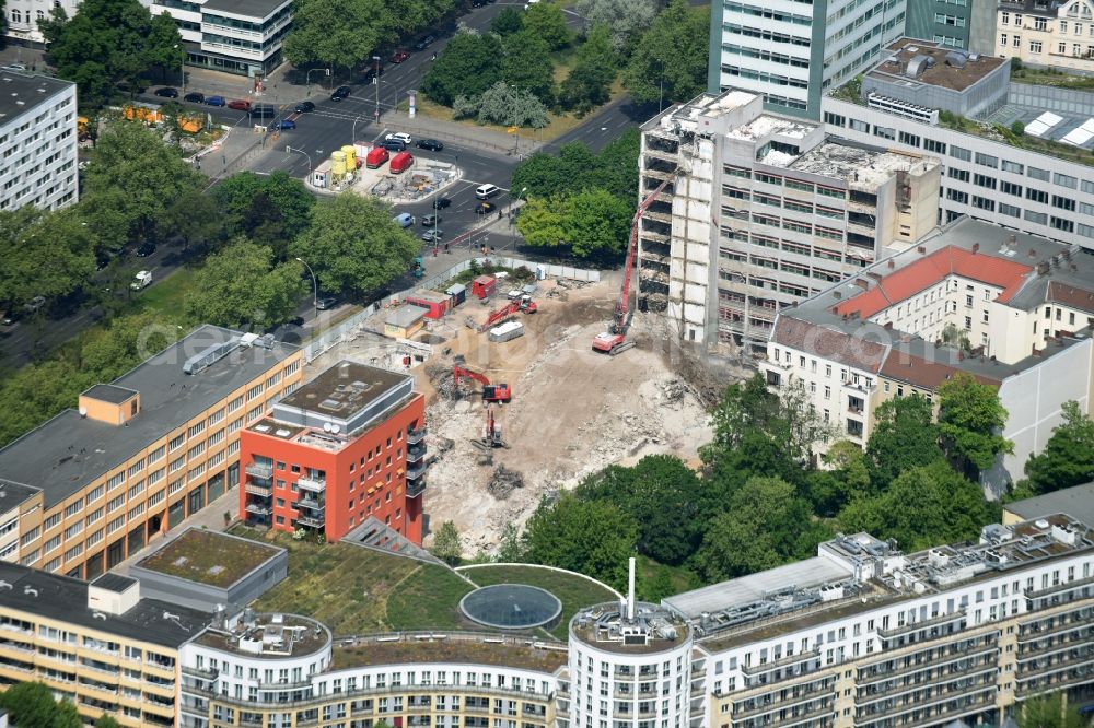 Berlin from the bird's eye view: Demolition work on Construction site for the new building of commercial and office buildings and apartments in Berlin, Germany