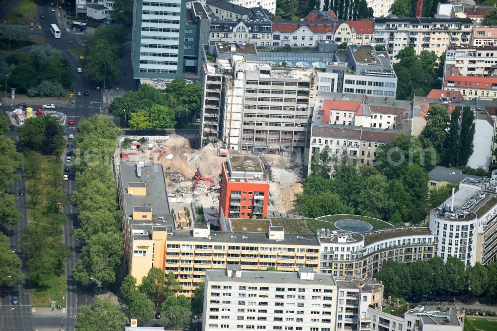 Berlin from the bird's eye view: Demolition work on Construction site for the new building of commercial and office buildings and apartments in Berlin, Germany